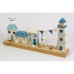 Lighthouse and 3 Cottages on Plinth, 32cm